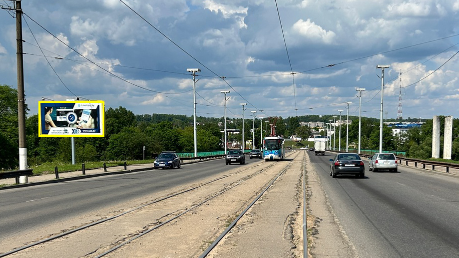 Витебск, Новолуческая ул.(справа от моста) возле ТЦ «Корона» сторона B. Изображение 0.